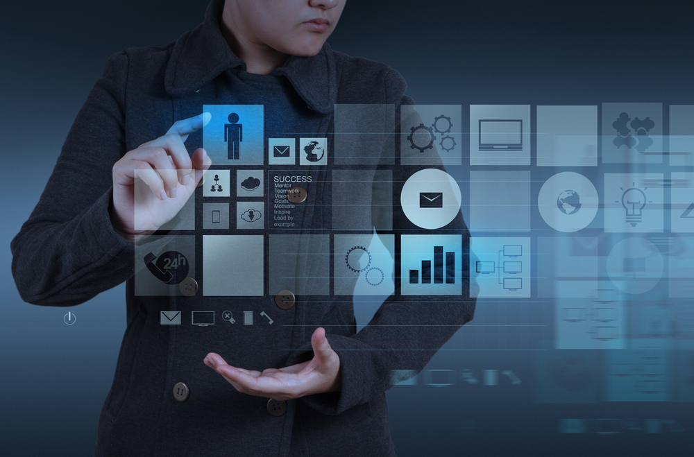 Website designer working with the new computer interface as design concept Website designer working with the new computer interface as design concept